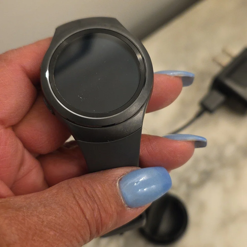 Samsung Smartwatch with Charging Stand.